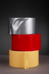 Three rolls of scotch tape close-up.