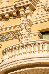 Fototapeta premium MONTE CARLO, MONACO 29.11.2020 Statue on the facade of the Opera in Monte-Carlo. Hight quality photo