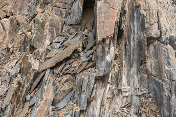 Strata of Slate is a fine-grained  homogeneous metamorphic rock derived from  shale type sedimentary rock composed of clay or volcanic ash. It is found in Himalayas in Himachal Pradesh, India.