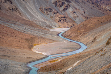 Meander is one of a series of regular sinuous curves in a river, produced by river as it erodes the...
