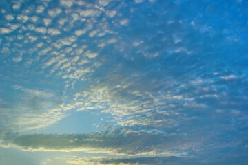 Naklejka na ściany i meble Blue sky with clouds. Wonderful blue sky with clouds for background