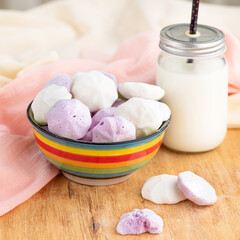 Sweet and airy bizet in a bowl on the table with copy space.