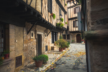 Half-timbered old houses in the main square of Alet-les-Bains, a town in France