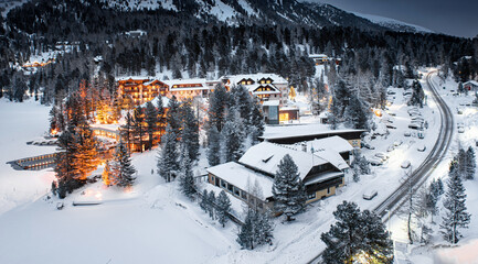 View on the mountains with hotels in Turracher Höhe, Austria in winter