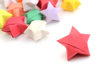 Colorful origami lucky stars and red star