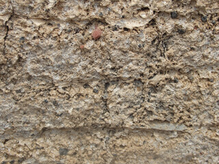 Background from rock texture close-up. The wall of natural stone