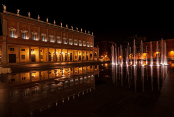 The Romolo Valli Municipal Theater in Reggio Emilia( Italy) with bright modern fountain