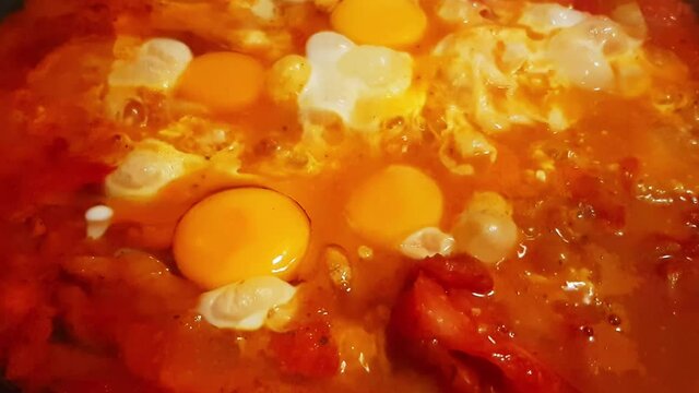 Cooking traditional Hungarian dish called lecs&oacute;