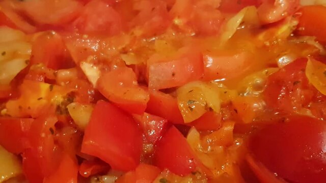 Cooking traditional Hungarian dish called lecs&oacute;