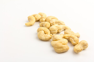 Raw cashew nuts isolated on white background.