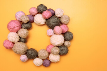 Fototapeta na wymiar Colorful rainbow yarn for knitting, Christmas wreath, Needlework