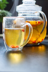fruit tea teapot fresh fruits and berries citrus hot beverage mint and other warming drink in a kettle on the table healthy top view copy space for text food background rustic