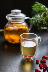 fruit tea teapot fresh fruits and berries citrus hot beverage mint and other warming drink in a kettle on the table healthy top view copy space for text food background rustic