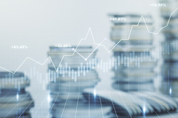 Double exposure of abstract creative financial chart hologram on growing stacks of coins background, research and strategy concept
