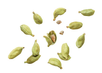 Cardamom pods whole and chopped fly on a white background. Isolated - obrazy, fototapety, plakaty