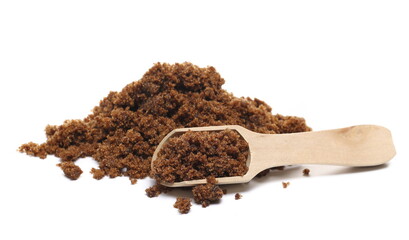 Sugar muscovado in wooden spoon isolated on white background