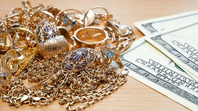 many golden and silver jewerly and money, pawnshop concept, jewerly shop concept