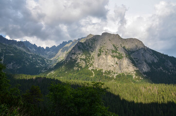 Obraz premium Picturesque view to rocky mountains against cloudy sky in High Tatras (Vysoke Tatry), Slovakia