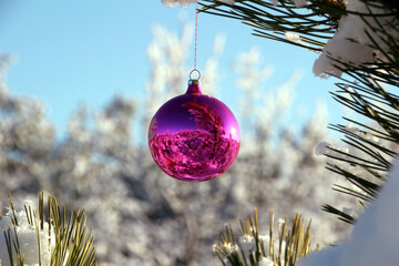 christmas toy in winter forest