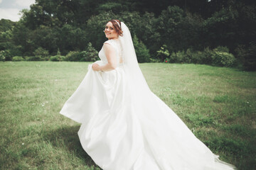 Beautiful luxury bride in elegant white dress