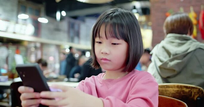 Asian girl use mobile phone