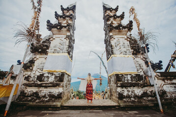 Beautiful girl spending time at the .Heaven s door gates at  Lempuyang, Bali