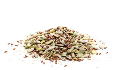 Pile mix seeds, sunflower, sesame, linseed and pumpkin seed isolated on white background