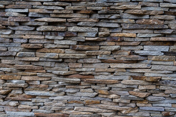 Decorative brick wall with brown seamless texture