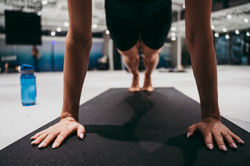 Fototapeta premium Beautiful girl training in the gym.