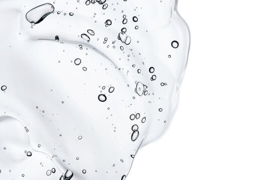 Transparent hyaluronic acid gel texture isolated on a white background.