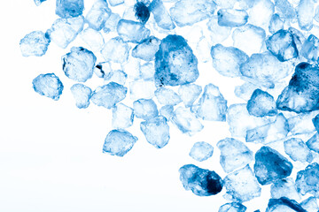 Sea salt crystals isolated on a white background. Tinted blue.