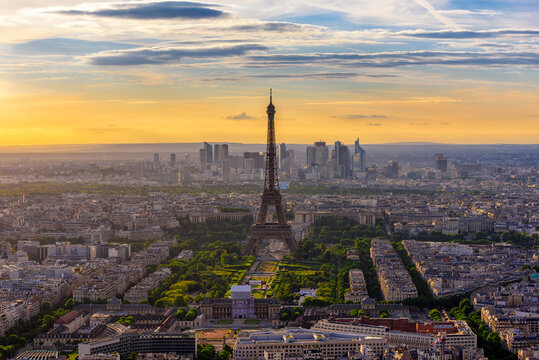 Skyline of Paris with Eiffel Tower at sunset in Paris, France
