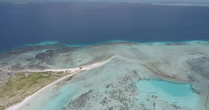 Los roques Venezuela. cankys island.  Aerial view forward descending movement pan rigth.
