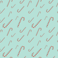 Seamless Christmas pattern with lollipops on green background, 3d rendering