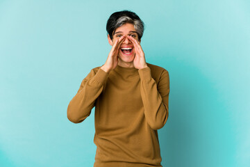 Young caucasian skinny man expressing emotions isolated on blue background