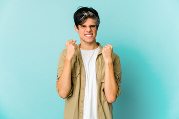 Young caucasian skinny man expressing emotions isolated on blue background
