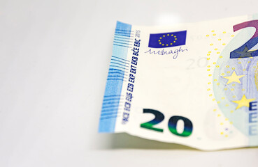 Detail of a 20 euro banknote isolated on a white background