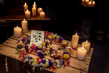 Christmas Handlettered Watercolor Greetingcards with dried flower Bouquet peace sign hippie candle lights background 