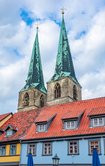 Fototapeta na wymiar Towers of old gothic church in Quedlinburg, Hermany