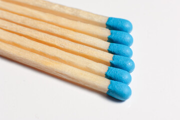 Blue matches on a white background