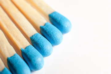 Blue matches on a white background