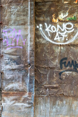 OLD METAL DOOR WITH GRAFFITIS