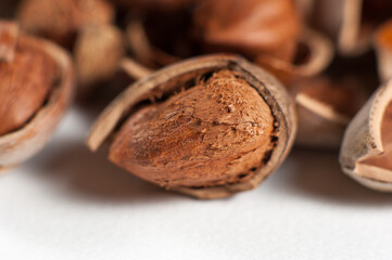 Hazelnuts and cracked nutshells