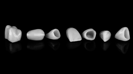 excellent composition of dental veneers on black glass in black and white