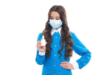 healthy child in protective mask against coronavirus offer nasal drops for health during covid pandemic and quarantine, medicament