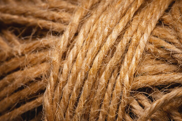 Fototapeta premium Natural rope twine textured background close up plan. Fibers in a mess rustic style