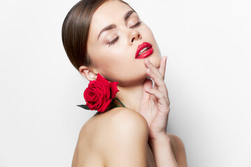 Naklejka na ściany i meble Beautiful woman naked shoulders Closed eyes rose flower luxury 