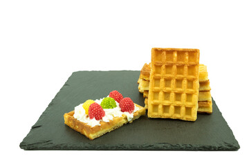 Biscuit waffles on a white plate with space for text