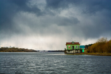 Fototapeta premium Rescue team building in the storm on Oka river in Moscow region in April