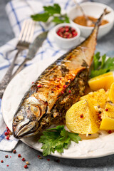 Baked mackerel with herbs and pepper.